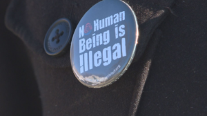 No Human Being is Illegal Button